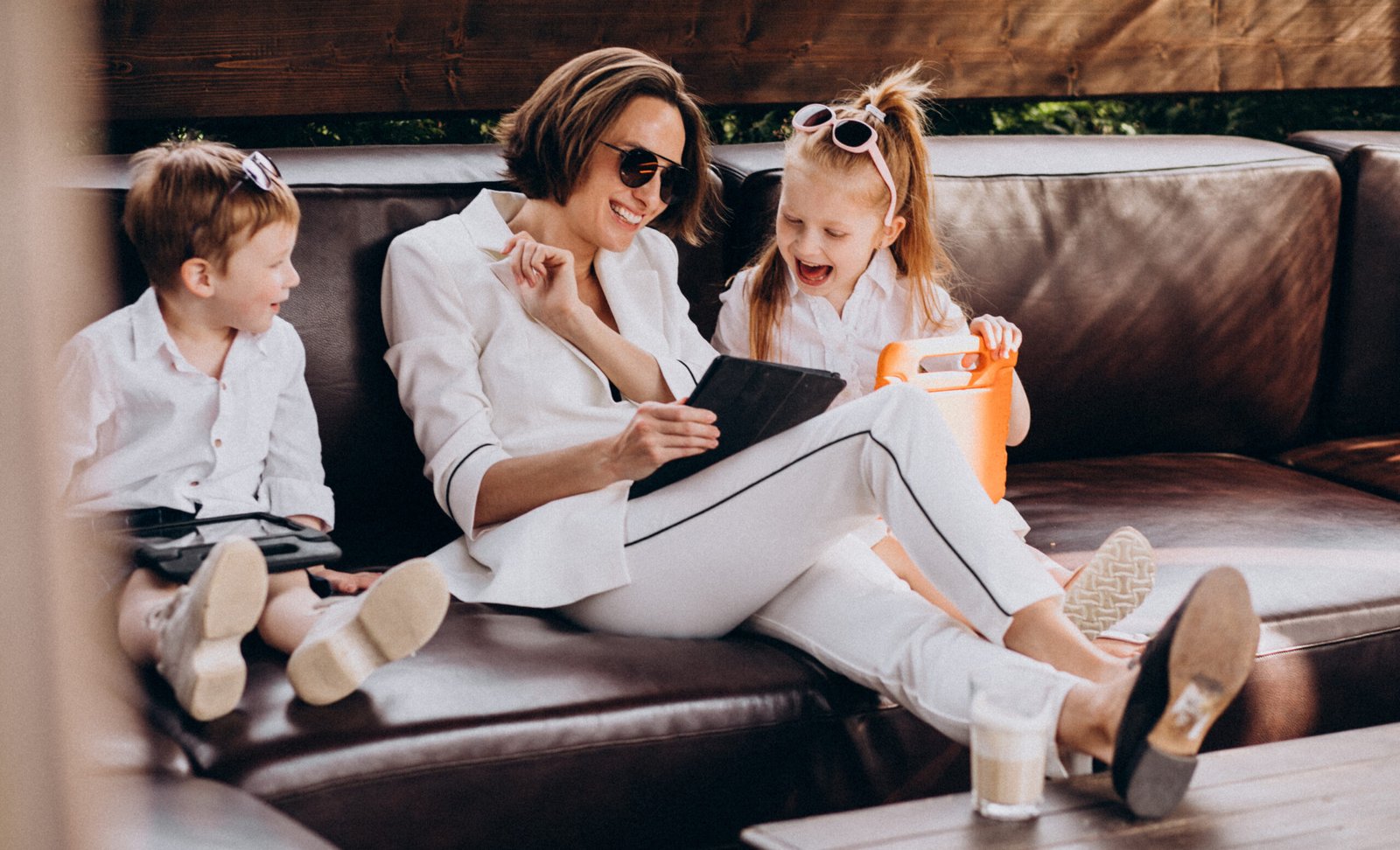 Business woman mother working from home with kids